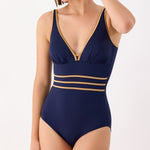 Model wearing Janine Robin 'Venezia' Navy Blue Plunge Swimsuit (front view).