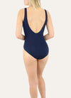 Model wearing Janine Robin 'Grace' Navy Blue Plunge Swimsuit (back view).