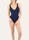 Model wearing Janine Robin 'Grace' Navy Blue Plunge Swimsuit.