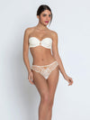 Model wearing 'Bellissime Amour' Ivory Silk Thong, by Lise Charmel (front view).