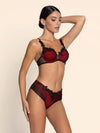 Model wearing 'Belissime Inconnue' Red and Black Shorty, from Lise Charmel (side view).