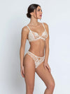 Model wearing 'Bellissime Amour' Ivory Italian Brief, by Lise Charmel (side view).