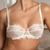 Model wearing 'Bellissime Amour' Ivory Half Cup Bra, by Lise Charmel (front view).