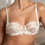 Model wearing 'Bellissime Amour' Ivory Half Cup Bra, by Lise Charmel (front view).
