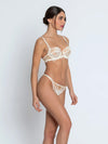 Model wearing 'Bellissime Amour' Ivory Half Cup Bra, by Lise Charmel (side view).