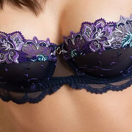 Model wearing 'Déesse Désirs' Midnight Blue Half Cup Bra, by Lise Charmel (detail).