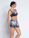 Model wearing 'Déesse Désirs' Midnight Blue Padded Plunge Bra, by Lise Charmel (side view).