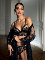 Model wearing 'Desirs de Venise' Black Italian Brief, by Lise Charmel (front view).