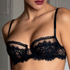 Model wearing 'Desirs de Venise' Black Balconette Bra, by Lise Charmel (front view).