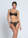 Model wearing 'Desirs de Venise' Black Balconette Bra, by Lise Charmel (front view).