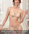 Model wearing Lise Charmel 'Dressing Floral' Beige lingerie.