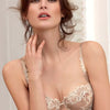 Beautiful female model wearing pearl Dressing Floral balconette bra by Lise Charmel.