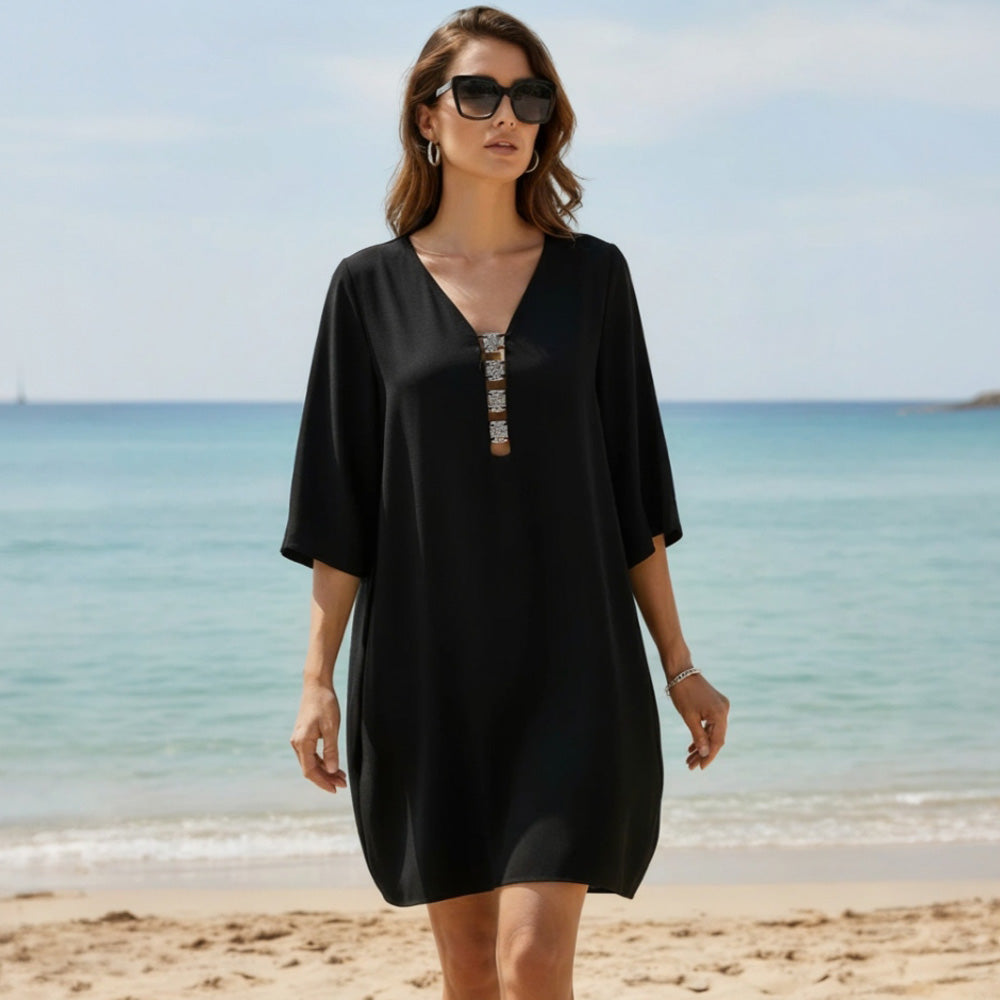 Model wearing 'Eclat D’Argent' Black Beach Tunic, by Lise Charmel (front view).