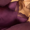 Model wearing 'Élégance Artist' Plum Purple Silk Nightie, by Lise Charmel (front view, close up).
