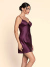 Model wearing 'Élégance Artist' Plum Purple Silk Nightie, by Lise Charmel (side view).
