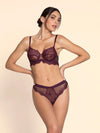 Model wearing 'Élégance Artist' Plum Purple Italian Brief, by Lise Charmel (front view).