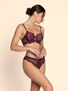 Model wearing 'Élégance Artist' Plum Purple Italian Brief, by Lise Charmel (side view).