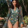 Model in lush Mediterranean garden wearing Lise Charmel Fleur Persane multicolour swimsuit.