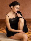 Model wearing 'Plaisir Caresse' Black Chemise, by Lise Charmel.