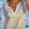 Model wearing 'Romance Couture' White Beach Tunic, by Lise Charmel (close-up).