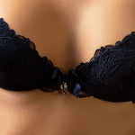 Model wearing Lise Charmel 'Soir de Venise' Midnight Blue Padded Plunge Bra (detail).