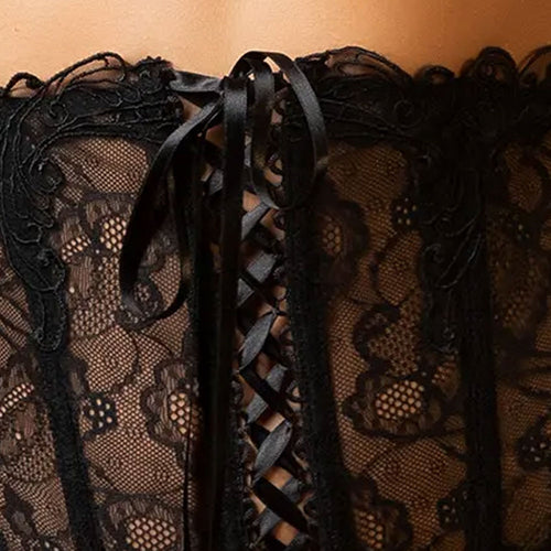 Model wearing Lise Charmel 'Soir de Venise' Black Waspie (detail).