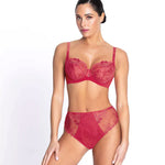 Model wearing 'Source Beauté' High Waist Brief in Hibiscus Beauté (Coral). by Lise Charmel.