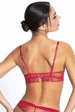 Model wearing 'Source Beauté' Half Cup/Balconette Bra in Hibiscus Beauté (Coral), by Lise Charmel.