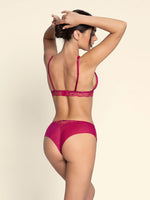 Model wearing 'Splendeur Soie' Raspberry Pink Silk Shorty, by Lise Charmel (back view).