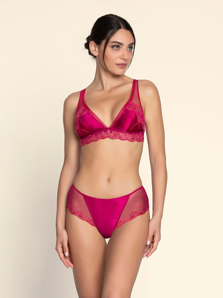 Model wearing 'Splendeur Soie' Raspberry Pink Silk Shorty, by Lise Charmel (front view).