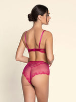 Model wearing 'Splendeur Soie' Raspberry Pink Silk High-Waisted Shorty, by Lise Charmel (back view).