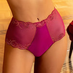 Model wearing 'Splendeur Soie' Raspberry Pink Silk High-Waisted Shorty, by Lise Charmel (front view, close up).
