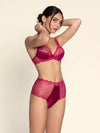 Model wearing 'Splendeur Soie' Raspberry Pink Silk High-Waisted Shorty, by Lise Charmel (side view).