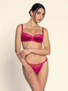 Model wearing 'Splendeur Soie' Raspberry Pink Silk Half Cup Bra, by Lise Charmel (front view).