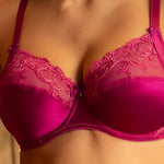 Model wearing 'Splendeur Soie' Raspberry Pink Silk 3-Part Full Cup Bra, by Lise Charmel (front view, close up).