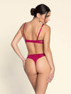 Model wearing 'Splendeur Soie' Raspberry Pink Silk Padded Plunge Bra, by Lise Charmel (back view).