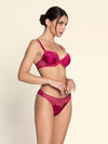 Model wearing 'Splendeur Soie' Raspberry Pink Silk Padded Plunge Bra, by Lise Charmel (side view).