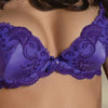 Model wearing 'Splendeur Soie' Violet Silk Padded Plunge Bra, by Lise Charmel (detail).