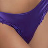 Model wearing 'Splendeur Soie' Violet Silk Italian Brief, by Lise Charmel (detail).