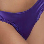 Model wearing 'Splendeur Soie' Violet Silk Italian Brief, by Lise Charmel (detail).