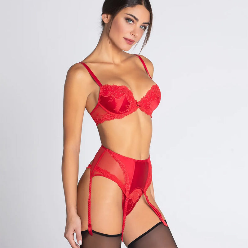 Model wearing 'Splendeur Soie' Suspender Belt in Rouge (red), by Lise Charmel (side view).