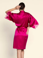 Model wearing 'Splendeur Soie' Carmine Silk Negligée Gown, by Lise Charmel (back view).