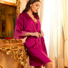 Model wearing 'Splendeur Soie' Carmine Silk Negligée Gown, by Lise Charmel (front view).