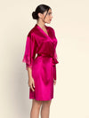 Model wearing 'Splendeur Soie' Carmine Silk Negligée Gown, by Lise Charmel (side view).