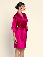 Model wearing 'Splendeur Soie' Carmine Silk Negligée Gown, by Lise Charmel (side view).