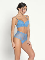 Model wearing 'Sublime en Dentelle' Azure Blue Contour Bra, by Lise Charmel (side view).