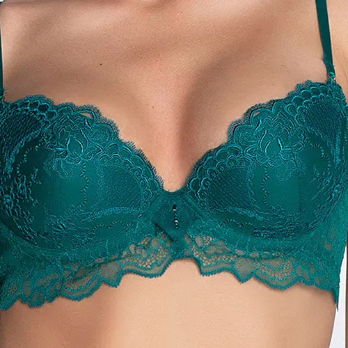 Model wearing 'Sublime en Dentelle' Viridian Green Padded Plunge Bra, by Lise Charmel (detail).