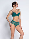 Model wearing 'Sublime en Dentelle' Viridian Green Padded Plunge Bra, by Lise Charmel (front side view).