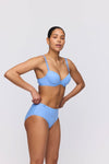 Model wearing 'Avero' Pastel Blue Full Brief, by Marie Jo (side view).