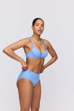 Model wearing 'Avero' Pastel Blue Full Brief, by Marie Jo (side view).